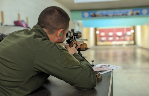 Precision shooting session focusing on firearm safety and handling