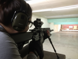 Precision shooting session focusing on firearm safety and handling