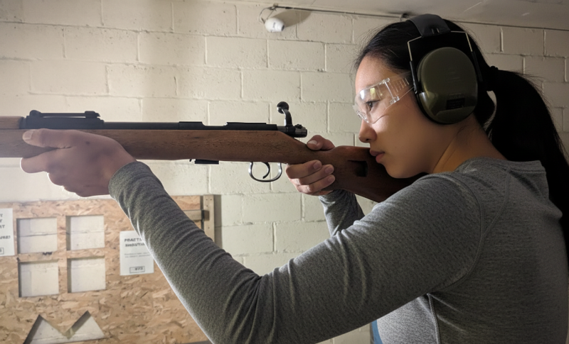 Precision shooting session focusing on firearm safety and handling