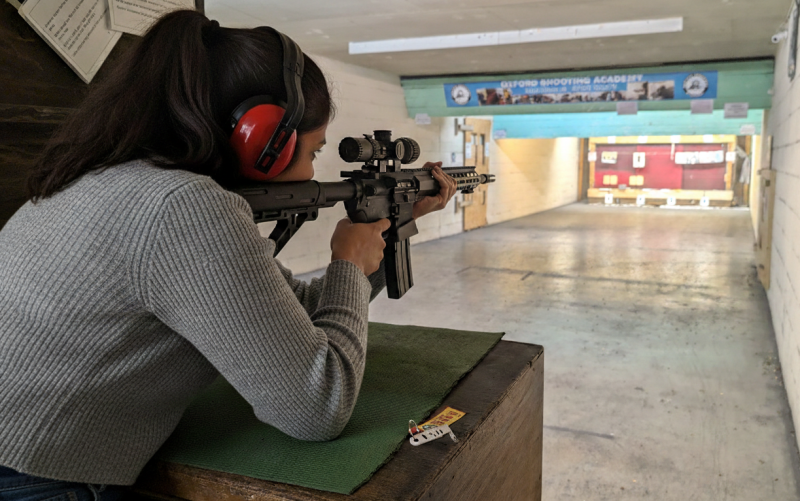Precision shooting session focusing on firearm safety and handling